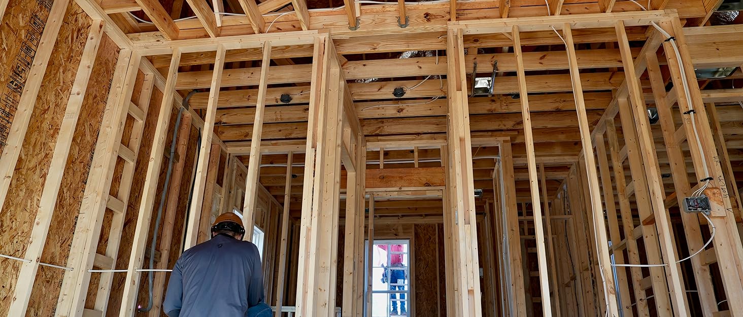 man working on residential house jobsite